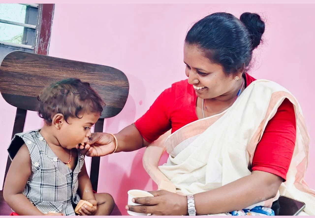 Juliyes Vanathaian with child